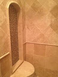 Custom Travertine Shower Bench With Arched Niche And Rope Trim Black And White Tiles Bathroom Travertine Shower Traditional Bathroom