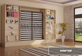 Çünkü bu evler ufak olduğu için kirası da daha düşük oluyor. Katlanir Yatak Akilli Mobilya Duvar Yataklari