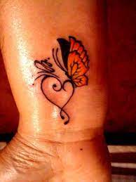 Butterfly Tattoos Heart Tattoos Butterfly Wrist Tattoo Butterfly Tattoo Butterfly Tattoo Designs