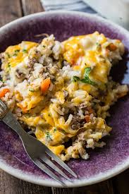 Cheesy Ground Beef And Rice Casserole Oh Sweet Basil Recipe Beef Dinner Easy Casserole Recipes Ground Beef Recipes Easy