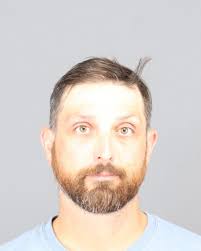 Why do New Carlisle city officials need guns?