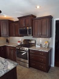 Choosing the right kitchen paint colors with oak cabinets or maple cupboards will highlight the tone of the wood, according to better homes and gardens. Maple Cabinets Black Glaze Houzz