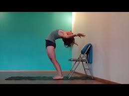 Yoga Tips With Christina Sell Yoga Learn To Drop Back With The Help Of A Chair Yoga Tips Iyengar Yoga Yoga