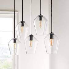 One of the materials listed is lead, and because most light fixtures contain brass in the sockets or in the frames of the shades, we are required to put this. Arren Black Linear 5 Light Pendant With Clear Angled Shades Crate And Barrel