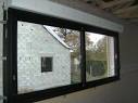 Remplacer porte de garage par fenetre alu