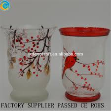 Hurricane candle holders get their name from their ability to shield a candle flame from all but the stiffest passing breeze. Hummingbird Crackled Glass Hurricane Candle Holder Table Lamps Christmas Xmas Decor Buy Antique Glass Hurricane Candle Holders Crackled Glass Hurricane Votive Candle Christmas Cardinal Glass Candle Holder Product On Alibaba Com