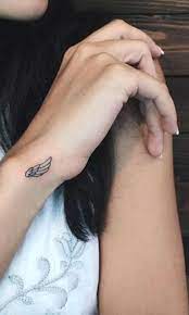 Angel wings wrist tattoo pic 5 www tattoostime com 18 kb. Angel Wings Tattoo Designs On Arm Arm Tattoo Sites