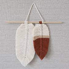 Learn how to make a large diy macrame wall hanging in this step by step tutorial & video! Diy Boho Macrame Feather Wall Hanging Willow Bloom Home