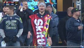Revel in the bond between. Marshawn Lynch Likes Skittles So Man Wears Skittles Costume Cbssports Com