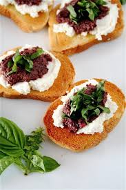 Bruschetta With Black Olive Pesto Ricotta And Basil Olive Pesto Food Bruschetta