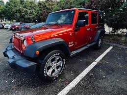 Image result for Flame Red 2009 Jeep