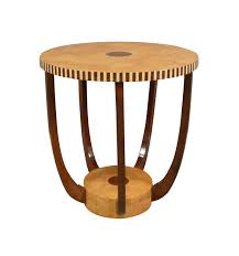 An art deco style marble top coffee table with a blanco equador marble top, on a solid brass base with tapered supports and a stretcher base. Art Deco Round Coffee Table Art Deco Furniture