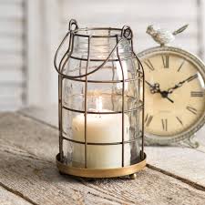 Bell jar lanterns have cast off the darkness since the dark ages — could one light the way in your the glass cap, known as the smoke bell, was designed to keep candle smoke from blackening the. Amazon Com Attractive And Graceful Quart Mason Jar Candle Cage Antique Brass Metal Lantern Candle Holder With Clear Glass Rustic Indoor Outdoor Light For Your Home Decor Modern Rustic Vintage Farmhouse