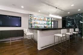 If you want to get a strong yet feminine touch to your home bar in a modern design, you can. African Wenge And Metal Contemporary Home Bar New York By Joseph And Curtis Custom Wine Cellars Houzz Au