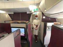 Qatar airways staff directs qatar business class passengers to the qantas business class lounge (airside, level 3). What It Was Like Flying Qatar Airways Qsuites Business Class During The Pandemic