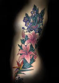 Floral tattoos have become common elements in the tattooing work as most of the tattoos are incorporated with flowers. Flower Side Tattoo By Full Circle Tattoos