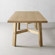 Crafted of hardwood solids, engineered wood, and veneers, the table features turned legs. Copenhagen Extendable Dining Table Williams Sonoma