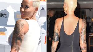 Amber Rose Covers Up Her Wiz Khalifa Tattoo With Another Man S Face In 2020 Sparkly Prom Dresses Burgundy Prom Dress Celebrities