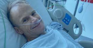 Former Australian of the Year undergoes brain surgery after health setback