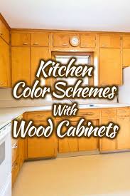 White kitchen cabinets with colorful kitchen island. Kitchen Color Schemes With Wood Cabinets 30 Picture Examples Home Decor Bliss