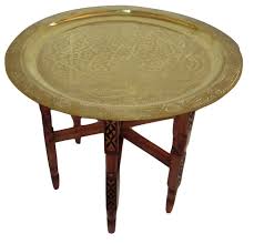 Many people use these tables as a tea or coffee table when placed in front of their couch. Moroccan Traditional Tea Table Engraved Brass Tray Top Folding Carved Wood 24 Buy Online In Belize At Belize Desertcart Com Productid 27416224