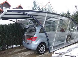 Garajes De Estilo Moderno De France Abris Specialiste Abri De Jardin Garage Carport Moderno Homify Abri Voiture Design Garage Abri De Voiture Moderne