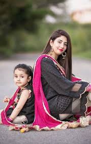 Fascinating curly mother and beautiful trendy daughter in the same outfit posing together after birthday party. 25 Coolest Matching Outfits For Pakistani Mother Daughter Part 2 Mother Daughter Matching Outfits Baby Frocks Designs Mother Daughter Fashion