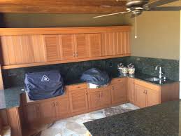 Now you can have everything you'd want. Custom Built Naturekast Kitchen With Tv Cabinet Tv In Kitchen Outdoor Kitchen Kitchen Cabinets