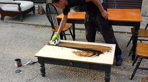 So i started at one end of the table with my power sander, in the direction of the wood grain of the band around the edge of the table. Eric Sanding A Coffee Table Part 3 The Staining Youtube