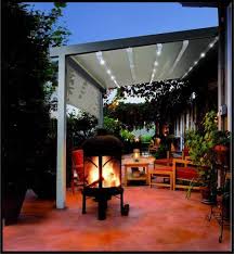 This retractable awning is motorized, which means that it creates instant shade with just the push of a button. 50 Shades Of Cool Awnings To Shade The Sun Milanese Remodeling Patio Shade Patio Backyard Pergola