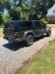 The concept jeep has a rooftop tent that can sleep four and features often found inside a typical camper, such as a refrigerator, stove, and table. Just Got The Camper Top From Are Installed What Are Y All Thoughts Jeepgladiator