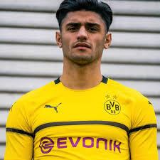 White stripes adorn the sides of the jersey, with a cannon. Borussia Dortmund 2020 21 Home Football Kits Shirts
