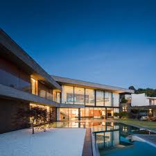 Most of our pool house plans and pool cabana plans offer a shower room, indoor and outdoor kitchen and covered balcony and more. Modern V Shaped House With The Most Gorgeous Interior Design