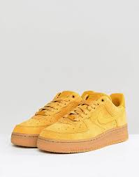 Designed by bruce kilgore and introduced in 1982, the air force 1 was the first ever basketball shoe to feature nike air technology, revolutionizing the game and sneaker culture forever. Nike Air Force 1 Mustard Suede Trainers With Gum Sole Asos