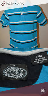 Black And Blue Striped Polo Shirt First Wave Striped Polo Shirt Sharp Looking Collared Turquoise Polo Shirt With Black And White Stripes There Are Striped Polo Shirt Wave Shirt Striped Shorts