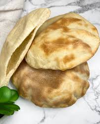 In a separate bowl or measuring cup, add water and apple cider vinegar. Easy Homemade Greek Pita Pocket Bread Recipe The Curry Mommy