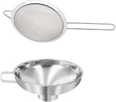 An extremely useful tool, with a clever steel strainer that clips with the funnel at the opening of the spout to remove debris, detritus, and other foreign matter that is not wanted within your final creations. Amazon Com Stainless Steel Canning Funnel And Fine Mesh Strainer With Long Handle For Wide Regular Jars Transferring Flour Dry Ingredients Set Of 2 Kitchen Dining