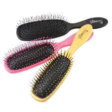 These hair brushes are designed to detangle wet (or dry) hair without causing breakage. Here S What Happened When I Tried This Detangling Brush For Natural Hair Hype Hair