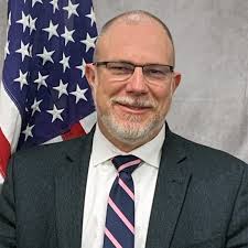 PEO Aviation congratulates John Van Houten, left in his new role as the  Assistant Program Executive Officer, Aviation for Engineering and  Architecture. Van Houten takes over for Matt Sipe, right, who led