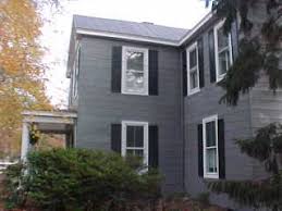 White siding black metal roof. Tin Roofing Saving Old Tin Metal Panels