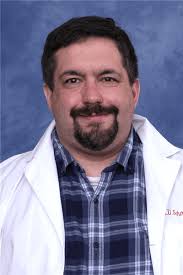 Christopher K. Poulos, MD