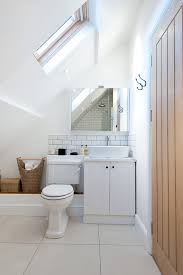 Small Bathroom Under Slanted Ceiling With White Toilet White Cabinet With White Sink Whit Bathroom Design Small Small Farmhouse Bathroom Small Bathroom Tiles