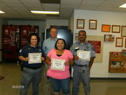 The Dalhart Unit Administration would like to congratulate the Dalhart Unit  August 2019 Employees of the Month. Pictured left to right: COIV Imelda  Ponce, Savannah Basaldua, COV Marco Conde; with Warden Billy