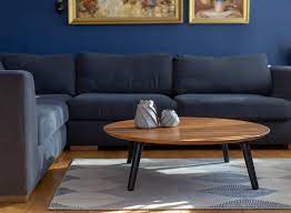 The table top is made of reclaimed poplar wood stained with yellow pine stain. Contrast Slice Coffee Table 100x31cm Round Black Legs Ragaba De