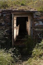 The septic tank is buried on a hillside complete with a door, venting system and more. Vintage Fridges Canadian Geographic