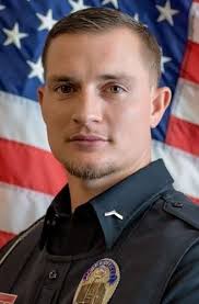 Officer nabs man although blinded by spray