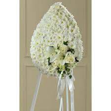 A professionally designed floral casket spray is a most special honour for us to create and deliver. Teardrop Standing Spray At Send Flowers