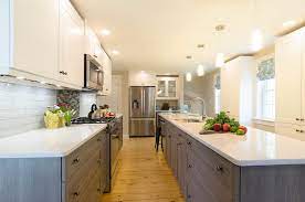 I'm seeing it in perimeter cabinets, in the form of islands, or in simple accents that bring warmth to the kitchen as a whole. White Shaker Kitchen With Wood Cabinets Lexington Ma Blog