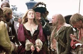 Blacksmith will turner teams up with eccentric pirate captain jack sparrow to save his love, the governor's daughter, from jack's former pirate allies, who are now undead. Elizabeth Swann S Red Dress Potc Wiki Fandom