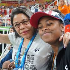 Simone Biles's biological mother says Olympic gymnast is 'gonna be okay'